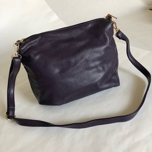 Plum colored cross body bag